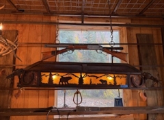 L 170 Western Iron Gun Bear 3 Light Chandelier 58" x 14" x 23"  $800